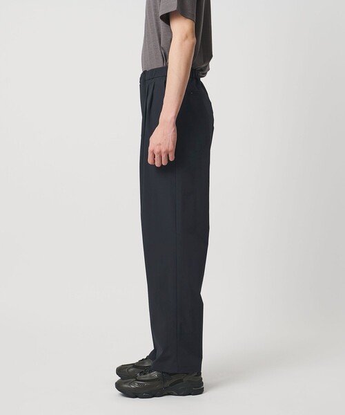 UNITED ARROWS（ユナイテッドアローズ）の「ウェザーコンフォート 2プリーツ バルーン テーパード イージーパンツ 撥水 ストレッチ（その他パンツ・メンズ・ネイビー・L/M/S/XL）」の5枚目の写真