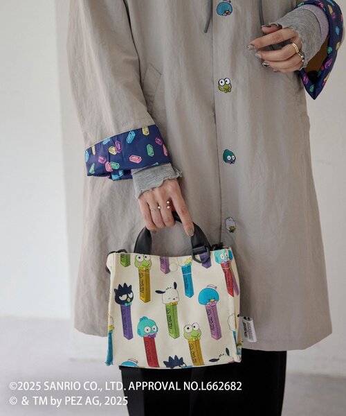 ear PAPILLONNER（イアパピヨネ）の「【はぴだんぶい×PEZ(ペッツ)×ear】コラボレインコート（その他アウター・レディース・ライトグレー・FREE）」の8枚目の写真