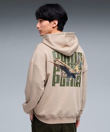 PUMA（プーマ）の「PUMA プーマ ユニセックス PUMA x モンスターハンターワイルズ フーディ バッ（スウェット）」