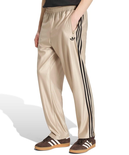 adidas(アディダス)の「adidas FIREBIRD METALLIC TRACK PANTS / アディダス ファイヤーバード メタリック トラックパンツ(その他パンツ・メンズ・カーキ・S/M/L/XL/XXL)」の1枚目の写真