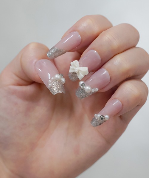 SPINNS（スピンズ）の「【nerine / ネリネ】リボン ネイルチップ