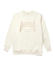 GRAIN DE BEAUTE（グランデボーテ）の「ARCH LOGO SWEAT [IVORY]（スウェット）」