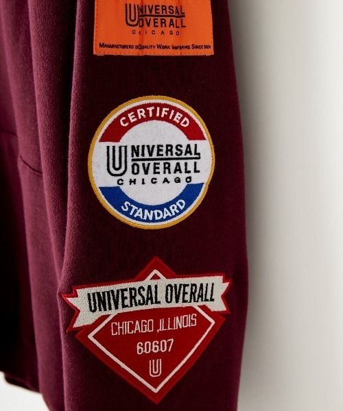UNIVERSAL OVERALL（ユニバーサルオーバーオール）の「[UNIVERSAL OVERALL/ユニバーサルオーバーオール] 別注 スタジャン風　ワッペン刺繍スウェットパーカー（パーカー・レディース・ダークグリーン/アイボリー/ワインレッド・M/L）」の7枚目の写真