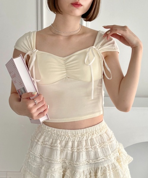 Loueme(ルエム)の「バレリーナリボンブラトップス(キャミソール・レディース・アイボリー/ピンク・FREE)」の1枚目の写真
