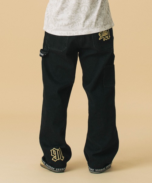 XLARGE（エクストララージ）の「OLD ENGLISH DENIM PAINTER PANTS（デニムパンツ・メンズ・インディゴブルー/ブラック・30inch/32inch/34inch/36inch）」の4枚目の写真