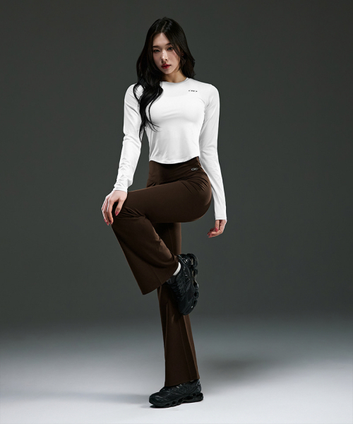 BORN TO WIN（ボーントゥウィン）の「W SYMBOL B QUICK DRY SEMI CROP LONG SLEEVE [WHITE]（Tシャツ/カットソー・レディース・その他・1/2）」の3枚目の写真