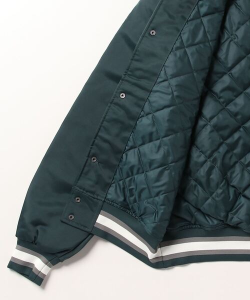 NIKE(ナイキ)の「ナイキ NIKE ナイキ サテン DUGOUT ジャケット NCPS(スタジャン・レディース・カーキ/ブルーグレー・L/M/S)」の4枚目の写真