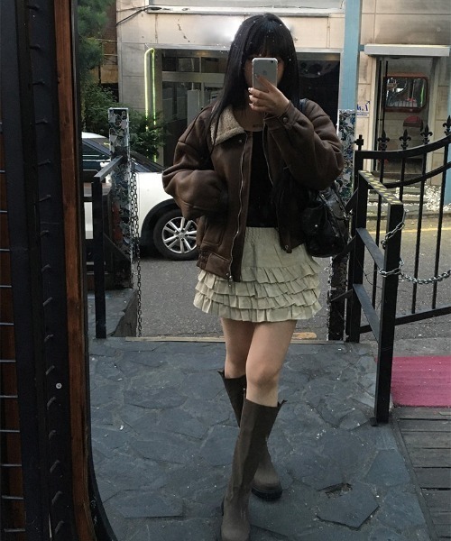 anyonemore（エニワンモア）の「フェイクレザーフリルティアードミニスカート（スカート・レディース・アイボリー/ブラック・FREE）」の11枚目の写真