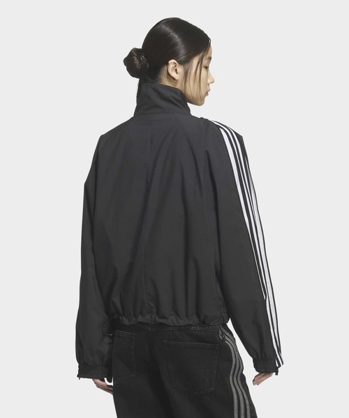 adidas(アディダス)の「スリーストライプス ジップ トラックトップ トラックジャケット(ジャージ) / アディダスオリジナルス adidas Originals(ナイロンジャケット・レディース・ブラック・X-LARGE/X-SMALL/LARGE/SMALL/MEDIUM/XX-LARGE)」の5枚目の写真