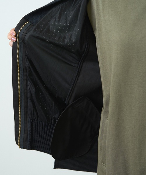 HERENCIA（ヘレンチア）の「MA-1風 ニットドッキング