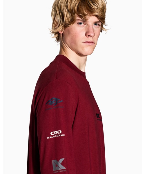 ARMANI EXCHANGE（アルマーニエクスチェンジ）の「【A|X アルマーニ エクスチェンジ】ランダムロゴ 長袖クルーネックTシャツ/REGULAR（Tシャツ/カットソー・メンズ・オフホワイト/ダークネイビー/レッド・X-LARGE/SMALL/MEDIUM/LARGE/XX-LARGE/X-SMALL）」の5枚目の写真