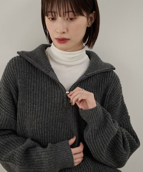 Shelly island（シェリーアイランド）の「ハーフジップニットトップス