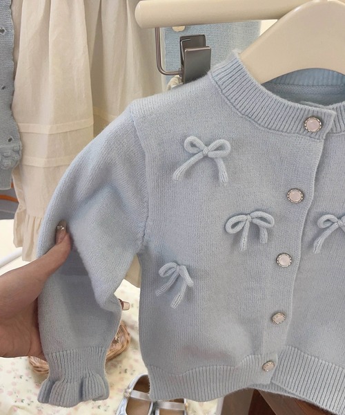 aimoha(アイモハ)の「【aimoha-KIDS-】キャンディースリーブリボンカーディガン(カーディガン/ボレロ・キッズ・ピンク/ブルー/オフホワイト・120/110/100/90/140/130)」の11枚目の写真