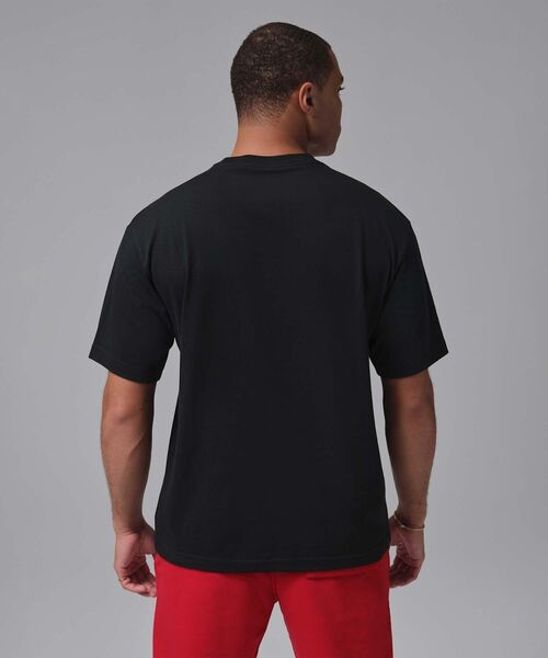 JORDAN BRAND(ジョーダンブランド)の「ジョーダン メンズ スニーカー パッチ Tシャツ / Jordan Men's Sneaker Patch T-Shirt IF3107-010 Black(Tシャツ/カットソー・メンズ・ブラック・XL/S/M/L/2XL)」の5枚目の写真