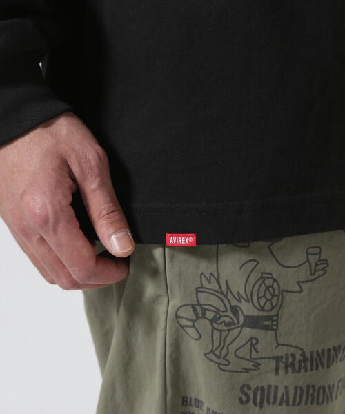 AVIREX（アヴィレックス）の「《直営店限定》DOLLARS DESIGN LONG SLLEVE T-SHIT / ダラーズ デザイン 長袖 Tシャツ / AVIREX / アヴィレックス（Tシャツ/カットソー・メンズ・ホワイト/ブラック・M/L/2XL/XL）」の10枚目の写真