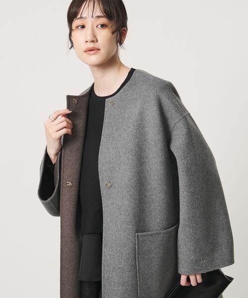 UNITED ARROWS(ユナイテッドアローズ)の「バイカラー リバー ミドルコート(その他アウター・レディース・その他1/ロイヤルブルー/オフホワイト/ネイビー/イエロー・36/38)」の7枚目の写真