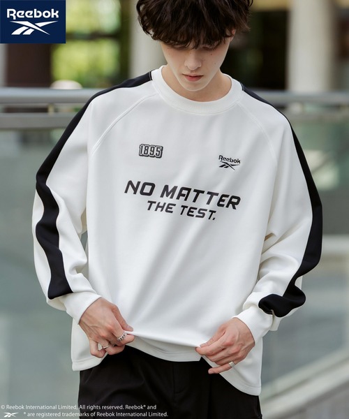 Rocky Monroe(ロッキーモンロー)の「Reebok リーボック オーバーサイズ袖ラインロゴ刺繍ラグランポンチ長袖ゲームシャツ(Tシャツ/カットソー・メンズ・ブルーグレー/ブラック/ホワイト・L/M)」の21枚目の写真