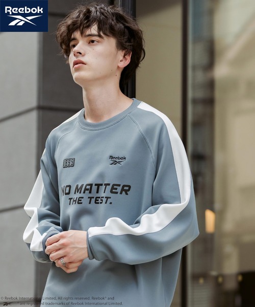 Rocky Monroe(ロッキーモンロー)の「Reebok リーボック オーバーサイズ袖ラインロゴ刺繍ラグランポンチ長袖ゲームシャツ(Tシャツ/カットソー・メンズ・ブルーグレー/ブラック/ホワイト・L/M)」の8枚目の写真