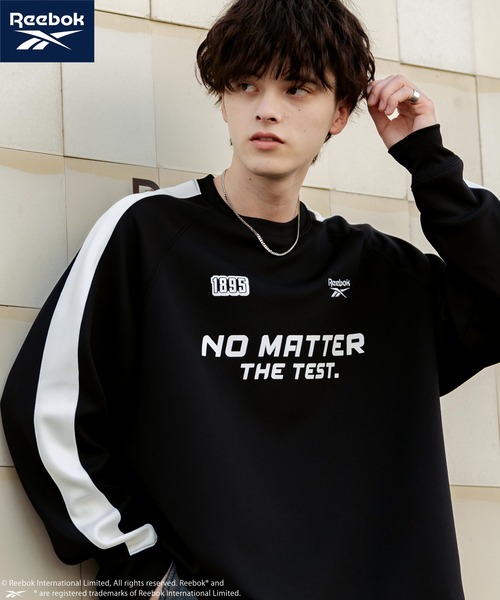 Rocky Monroe(ロッキーモンロー)の「Reebok リーボック オーバーサイズ袖ラインロゴ刺繍ラグランポンチ長袖ゲームシャツ(Tシャツ/カットソー・メンズ・ブルーグレー/ブラック/ホワイト・L/M)」の4枚目の写真