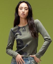 X-girl（エックスガール）の「HEAVY DISTRESSED LOGO L/S BABY TEE（Tシャツ/カットソー）」