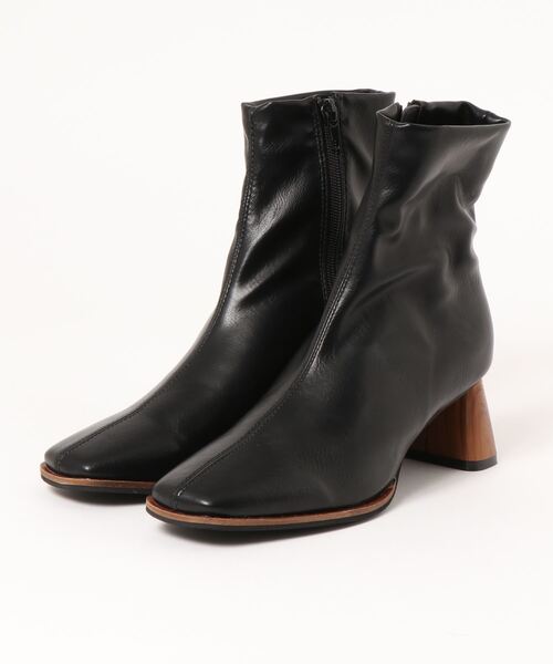 CPCM（シーピーシーエム）の「ウッドヒールブーツ（ブーツ・レディース・アイボリー/ブラック・SMALL/MEDIUM/LARGE）」の2枚目の写真