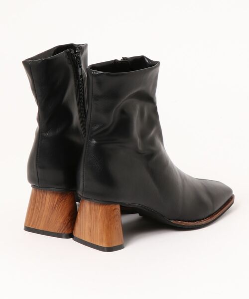 CPCM（シーピーシーエム）の「ウッドヒールブーツ（ブーツ・レディース・アイボリー/ブラック・SMALL/MEDIUM/LARGE）」の3枚目の写真