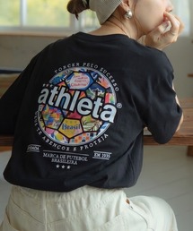 ATHLETA（アスレタ）の「【ZOZO限定・新柄追加】≪ATHLETA/アスレタ≫ブラジルのフットボールムードが映える大人のプリントTシャツ。ゆるっと体型カバーしながらレディースもメンズも着回せるサイズ対応（Tシャツ/カットソー）」