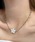 mebole�i���{���j�́uwhite flower chain necklace�i�l�b�N���X�j�v�b�V���o�[