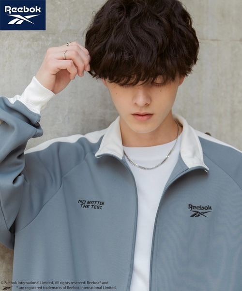 Rocky Monroe(ロッキーモンロー)の「Reebok リーボック オーバーサイズ袖ラインワンポイントロゴ刺繍ポンチトラックジャケット(ブルゾン・メンズ・ブラック/ホワイト/ブルーグレー・M/L)」の6枚目の写真