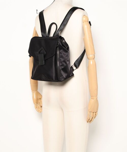 Three Four Time（ｽﾘｰﾌｫｰﾀｲﾑ）の「ナイロンフラップトリムレザー