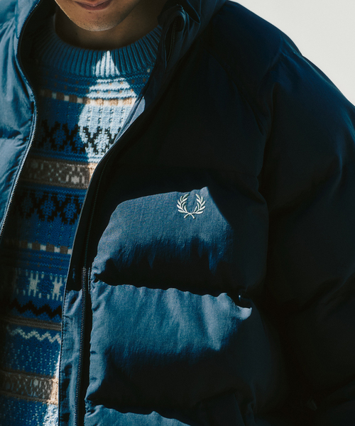 FRED PERRY(フレッドペリー)の「FRED PERRY / フレッドペリー RAGLAN SLEEVE PADDED JACKET(ナイロンジャケット・メンズ・ブラック/ネイビー・MEDIUM/LARGE)」の18枚目の写真