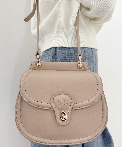 F i.n.t（フィント）の「型押しサークルポシェット/fint フィント（ショルダーバッグ・レディース・ブラウン/ピンクベージュ・FREE）」の2枚目の写真