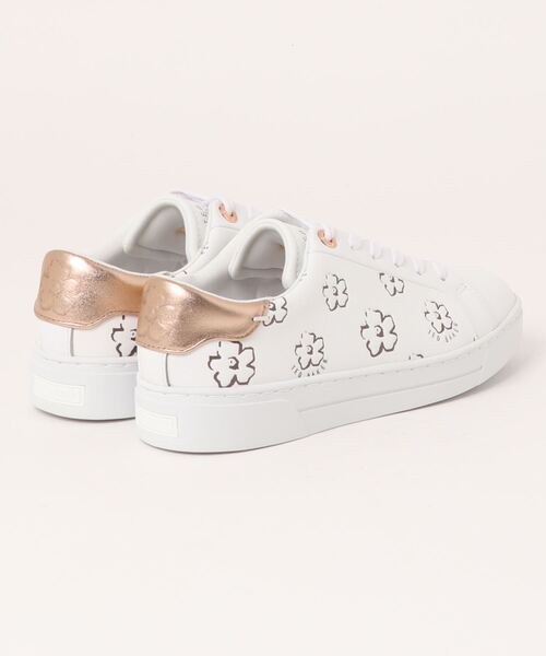 Ted Baker(テッドベーカー)の「TALIY マグノリアフラワー カプソール スニーカー (ホワイトxゴールド)(スニーカー・レディース・ゴールド系その他・38/39/37/36)」の2枚目の写真