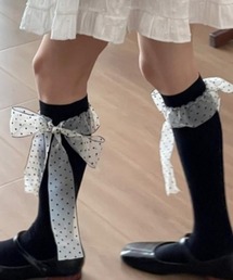 Sibra（シブラ）の「ドット柄リボン付きハイソックス（ソックス/靴下）」