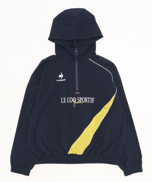 le coq sportif(ルコックスポルティフ)の「ルコックスポルティフ イヤートップクロスジャケット(ナイロンジャケット・レディース・オフホワイト/ネイビー・S/M/L/XL)」の2枚目の写真