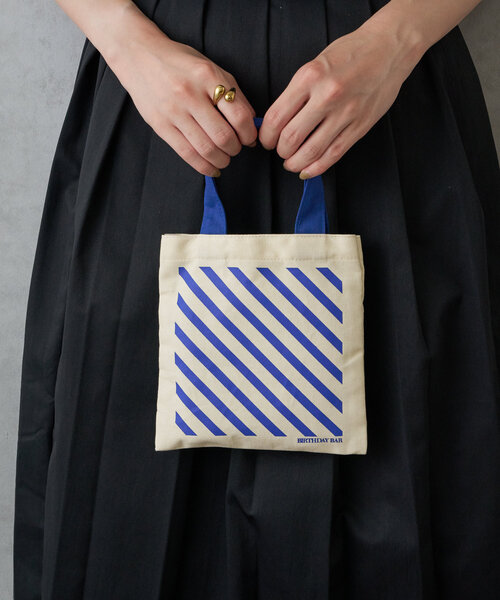 BIRTHDAY BAR（バースデイバー）の「MOTIF GEOMETRY　ミニスクエアフラットバッグ（トートバッグ・レディース・ネイビー/ピンク/オレンジ/アイボリー・0）」の2枚目の写真