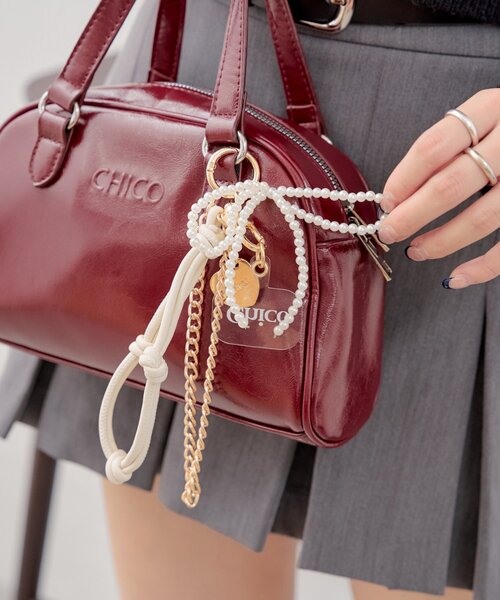 Chico(チコ)の「リボンパール付きコードチャーム(その他小物・レディース・アイボリー/ブラック/ブルー・FREE)」の2枚目の写真