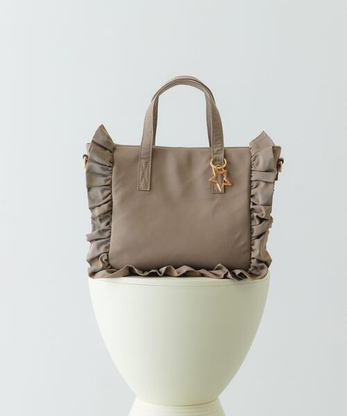 RODE SKO(ロデスコ)の「スターチャームフリルトートバッグ(トートバッグ・レディース・アイボリー/ブラック/モカ・ONE)」の1枚目の写真