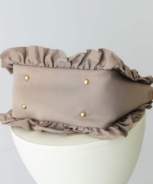 RODE SKO(ロデスコ)の「スターチャームフリルトートバッグ(トートバッグ・レディース・アイボリー/ブラック/モカ・ONE)」の9枚目の写真