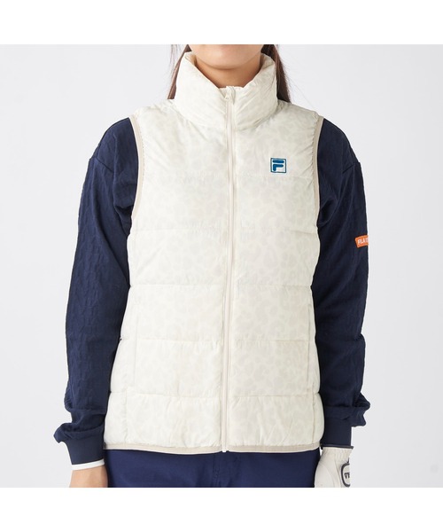 FILA GOLF(フィラゴルフ )の「FILA GOLF フィラゴルフ ゴルフウェア ワンポイント ロゴ 軽量 撥水 中綿入り フルジップ ハイネック ライトダウンベスト(ダウンベスト・レディース・オフホワイト/ブラック・LL/L/M)」の5枚目の写真
