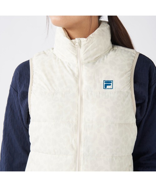 FILA GOLF(フィラゴルフ )の「FILA GOLF フィラゴルフ ゴルフウェア ワンポイント ロゴ 軽量 撥水 中綿入り フルジップ ハイネック ライトダウンベスト(ダウンベスト・レディース・オフホワイト/ブラック・LL/L/M)」の8枚目の写真