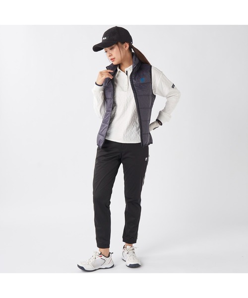 FILA GOLF(フィラゴルフ )の「FILA GOLF フィラゴルフ ゴルフウェア ワンポイント ロゴ 軽量 撥水 中綿入り フルジップ ハイネック ライトダウンベスト(ダウンベスト・レディース・オフホワイト/ブラック・LL/L/M)」の12枚目の写真