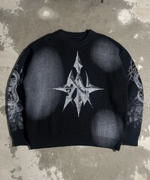 A‘gem 9（エージェムナイン）の「A'GEM/9 × .kom 『A'GEM/9/エージェムナイン』畦編みプリントニット（ニット/セーター）」