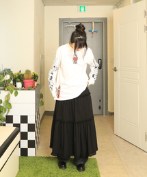 Monkey Flower（モンキーフラワー）の「スル装飾3段フレアロングスカート/MS6WSK02F_BLACK（スカート）」