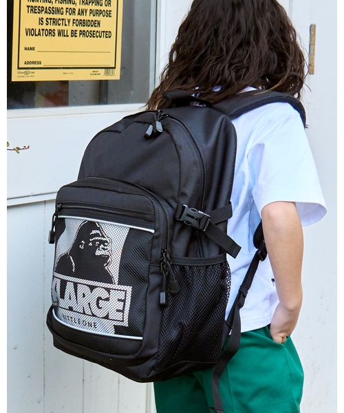 XLARGE ブラックリュック メッシュポケット付き　お値下げ OGメッシュポケットバックパック（バックパック/リュック）｜XLARGE