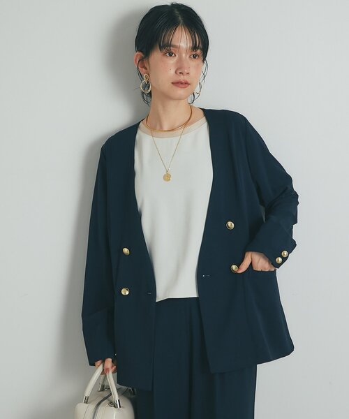 un dix cors(アンディコール)の「《セットアップ可・オフィスにも》ハイストレッチカルゼワッシャー金釦ジャケット(ノーカラージャケット・レディース・モカ/ネイビー・FREE)」の11枚目の写真