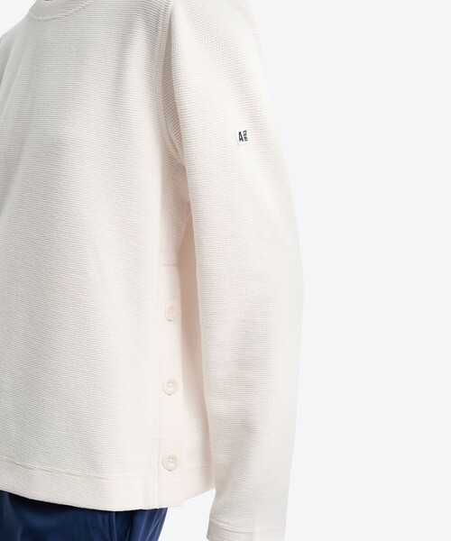 AIGLE（エーグル）の「サイドスリットボタン クルーネックフリースプルオーバー（スウェット・レディース・オフホワイト/ダークネイビー/レッド系その他・36/38/40）」の13枚目の写真