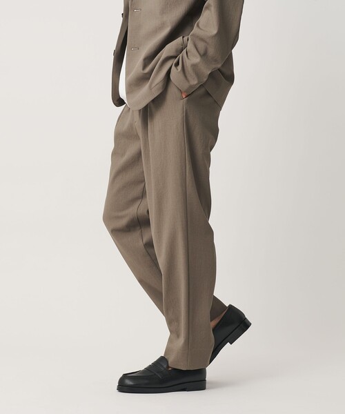 BEAUTY&YOUTH UNITED ARROWS(ビューティーアンドユースユナイテッドアローズ)の「KOMATSU ドビー イージー テーパード パンツ NO.9 ストレッチ 吸水速乾 セットアップ対応(その他パンツ・メンズ・ブラック/ベージュ・M/L/S/XL)」の1枚目の写真