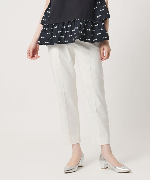 UNITED ARROWS(ユナイテッドアローズ)の「シャイニー スリム パンツ OFF WHITE ‐ストレッチ ウォッシャブル‐(スラックス・レディース・オフホワイト・34/42/32/36/38/40)」の1枚目の写真