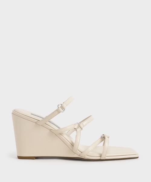 CHARLES & KEITH(チャールズ & キース)の「ストラッピー ウェッジミュール / Strappy Wedge Mules(サンダル・レディース・オフホワイト/ブラック/ブラウン系その他・23cm/25cm/22.5cm/24.5cm/23.5cm/25.5cm/22cm)」の1枚目の写真